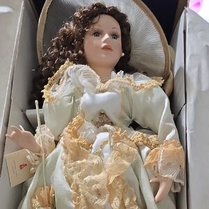 Elegant Porcelain Doll with Lace Dress